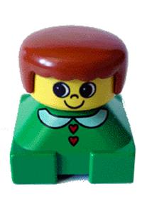 Duplo Figure with green base - Duplo figure brick with a green base, white collar with red heart buttons, yellow head, and dark orange female hair - 2327pb06