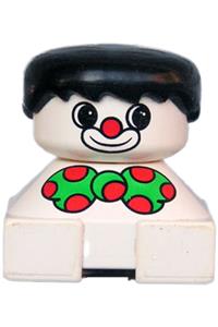 Duplo Clown - Clown Duplo figure with a white base, green bow with red dots, black hair, and white face with red nose - 2327pb18