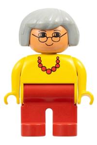 Duplo Female - Female Duplo figure with red legs, yellow top, red necklace, gray hair, glasses, and no white in eyes pattern - 4555pb013a