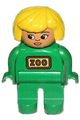 Female Duplo figure with yellow hair, wearing a green uniform and green legs in a zoo setting - 4555pb023