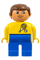 Male Duplo figure with blue legs, yellow top featuring tennis racket and ball pattern, and brown hair - 4555pb032