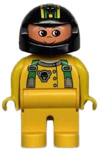 Duplo Male - Male Duplo figure with yellow legs, wearing a yellow top with green racer suspenders and a black helmet with stripes and bear pattern - 4555pb083