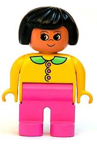Duplo Female - Female Duplo figure with dark pink legs, wearing a yellow top with dark pink buttons, medium green collar, and black hair - 4555pb127