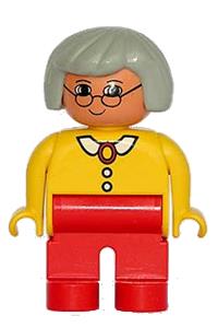 Duplo Female - Female Duplo figure with red legs, wearing a yellow blouse with white collar and 2 buttons, gray hair, and glasses - 4555pb132