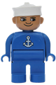 Male Duplo figure with blue legs, wearing a blue top with white anchor and a white sailor hat - 4555pb157