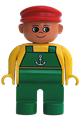 Duplo Figure, Male, Green Legs, Yellow Top with Green Overalls and Anchor, Red Cap - 4555pb168