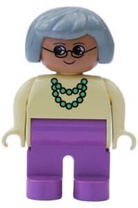 Duplo Female - Female Duplo figure with dark pink legs, wearing a yellow blouse with a green necklace and gray hair - 4555pb191