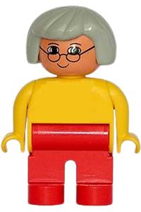 Duplo Female - Female Duplo figure with red legs, wearing a yellow blouse, gray hair, and glasses - 4555pb207