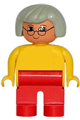 Female Duplo figure with red legs, wearing a yellow blouse, gray hair, and glasses - 4555pb207