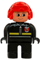 Male Duplo fireman with black legs, wearing a black top with fire logo and zipper, and a red aviator helmet - 4555pb214