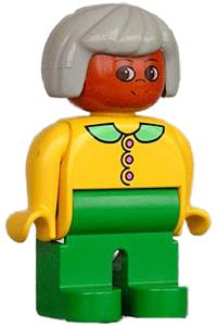 Duplo Female Gramma - Female Duplo figure with green legs, wearing a yellow blouse with collar, gray hair, and brown head - 4555pb227