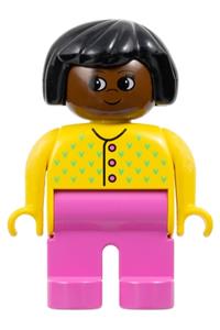 Duplo Female - Female Duplo figure with dark pink legs, wearing a yellow sweater with 3 buttons and black hair on a brown head - 4555pb228