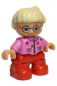 Duplo Child Girl - Lego Ville Duplo figure, a child girl with red legs wearing a dark pink top with flowers, light blond hair in a ponytail, and glasses - 47205pb006