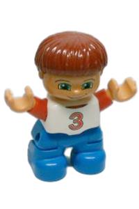Duplo Child Boy - A child boy Duplo figure from Lego Ville with dark red hair, white top with red '3' pattern, and blue legs - 47205pb020