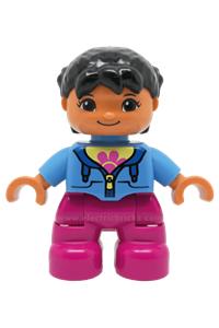 Duplo Child Girl - Duplo figure of a girl child with magenta legs, medium blue jacket over a flowered shirt, and black pigtails - 47205pb035