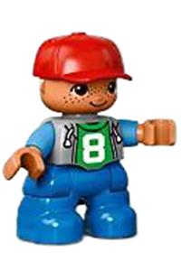 Duplo Child Boy - A boy Duplo figure from Lego Ville with blue legs, light bluish gray top with '8' pattern, medium blue arms, red cap, and freckles around eyes - 47205pb049