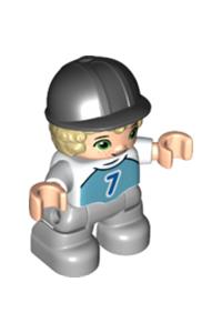 Duplo Figure Lego Ville, Child Boy, Light Bluish Gray Legs, Medium Azure Top with Number 7, Tan Hair, Black Riding Helmet 47205pb081