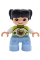 Child girl with black pigtails wearing a lime top with a pug dog pattern and bright light blue legs - 47205pb127