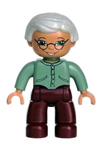 Duplo Female - Duplo LEGO Ville figure: Female with very light gray hair, green eyes, wearing sand green sweater, dark red legs, and glasses - 47394pb030