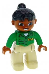 Duplo Female - Female Duplo figure with tan legs, green top with 'ZOO', black ponytail hair, and brown head - 47394pb158