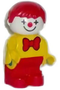 Duplo Child Clown - Duplo Clown figure of a boy with red hair, wearing a yellow top with a red bow tie, and red legs - 4943pb013