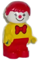 Duplo Clown figure of a boy with red hair, wearing a yellow top with a red bow tie, and red legs - 4943pb013