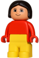 Duplo figure depicting a girl with yellow legs, wearing a red top and black hair - 4943pb015