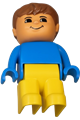 Child Duplo figure boy with yellow legs and brown hair, wearing a blue top - 4943pb016