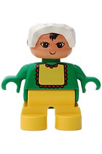 Duplo Baby - Child Duplo figure with yellow legs, green top, yellow bib with red lace, and white bonnet - 6453pb045