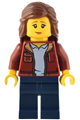 Female traveler wearing a dark red jacket over a bright light blue shirt, with dark blue legs and reddish brown hair - adp088