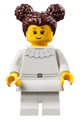 Girl ballerina student with dark brown hair in two buns, wearing a white dress with ruffled collar, white skirt, and white medium legs - bdp271