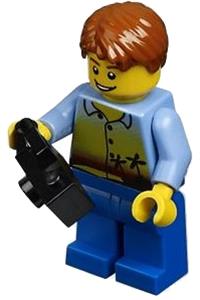 Male Tourist Minifigure - Minifigure with blue legs and short tousled hair, featuring a sunset and palm trees design - cty0275
