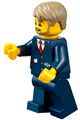 Bus driver with dark blue suit featuring train logo, dark tan short tousled hair, and a beard - cty0787