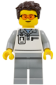 Male Formula 1 mechanic wearing a light bluish gray and white polo shirt, light bluish gray legs, dark brown tousled hair, and safety glasses - cty1834