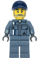 Male scrapyard worker in a dark blue cap, wearing a sand blue mechanic uniform and legs with a beard - cty1857