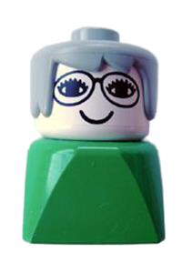 Duplo Female on Green Base - A female Duplo figure early brick on a green base with gray hair and glasses - dupfig006