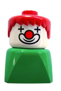 Duplo Clown on Green Base - A Duplo figure brick early with red hair, depicting a clown, placed on a green base - dupfig017