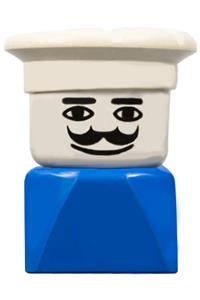 Duplo Male on Blue Base - Male Duplo figure on a blue base wearing a chef hat, with a moustache and with a 2 x 2 x 2 brick - dupfig028