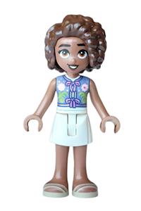 Friends Aliya - Aliya from Friends wearing a sand blue vest, a white skirt and tan sandals - frnd0907