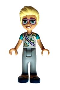 Friends Olly - Olly from Friends wears a white paisley shirt with light bluish gray trousers and dark blue shoes, carrying a lavender shoulder bag - frnd588