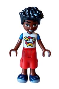 Friends Zac - Zac from Friends with white and blue shirt featuring pizza and game controller, red cropped trousers, and dark blue shoes - frnd605