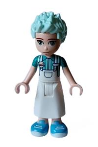 Friends Charli - Charli from Friends wears a white apron top over a dark turquoise shirt, a white long skirt, and medium blue shoes - frnd613
