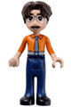 Martin is wearing an orange shirt with dark blue trousers and black shoes - frnd703