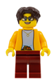 Woman with dark brown short wavy hair and glasses, wearing a bright light orange jacket over a light bluish gray shirt and dark red legs - fst041