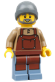 Barista with a reddish brown apron wearing a beanie hat. - gen158