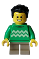 Boy in a bright green sweater with bright light yellow zigzag lines, dark tan short legs, black tousled hair, and freckles - hol332