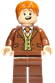 Fred Weasley wearing a reddish brown suit, dark orange tie, with a grin or smiling expression - hp433