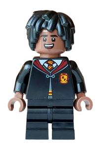 Lee Jordan Minifigure - Lee Jordan wearing a Gryffindor robe clasped, black medium legs, and short layered mop top hair - hp619
