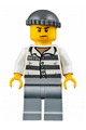 Prisoner 86753 in police custody wearing prison stripes, a dark bluish gray knit cap, and a scowl - jail006