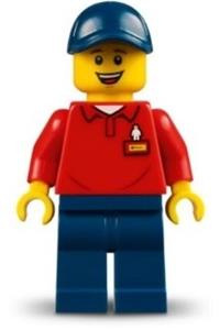 LEGOLAND Park Worker Male - Male LEGOLAND park worker with a dark blue hat, smiling, wearing a red polo shirt with 'LEGOLAND' on the back, and dark blue legs - llp019